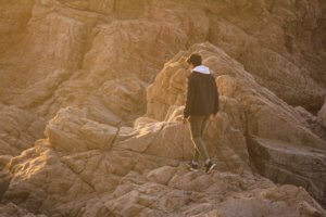 Person walking on brown rocky terrain