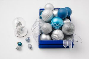 Blue and silver ornaments and decorations in box